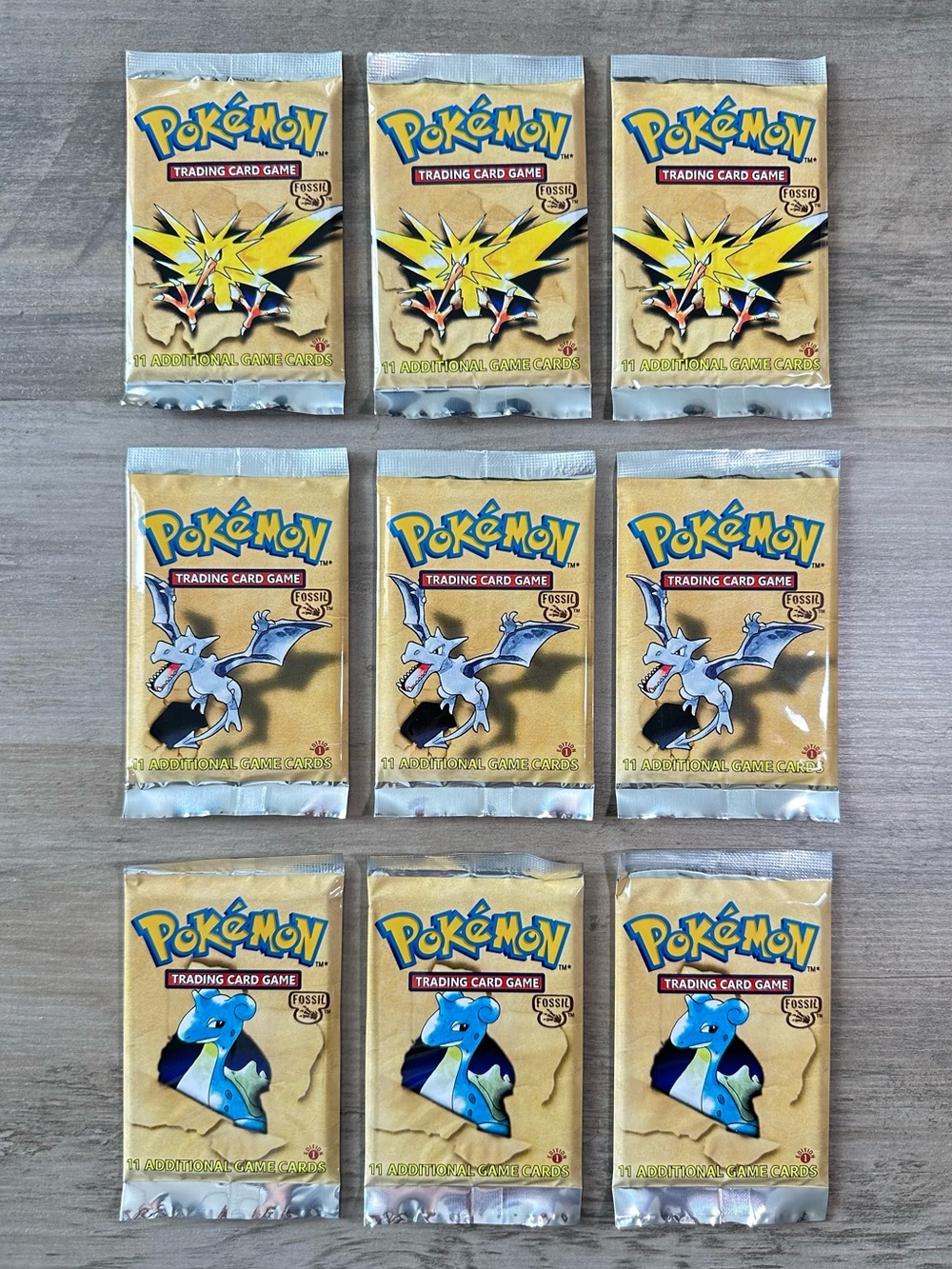 Pokemon Lot of (9) Sealed Unopened Packs 1999 1st Edition “Fossil” Novelty Cards